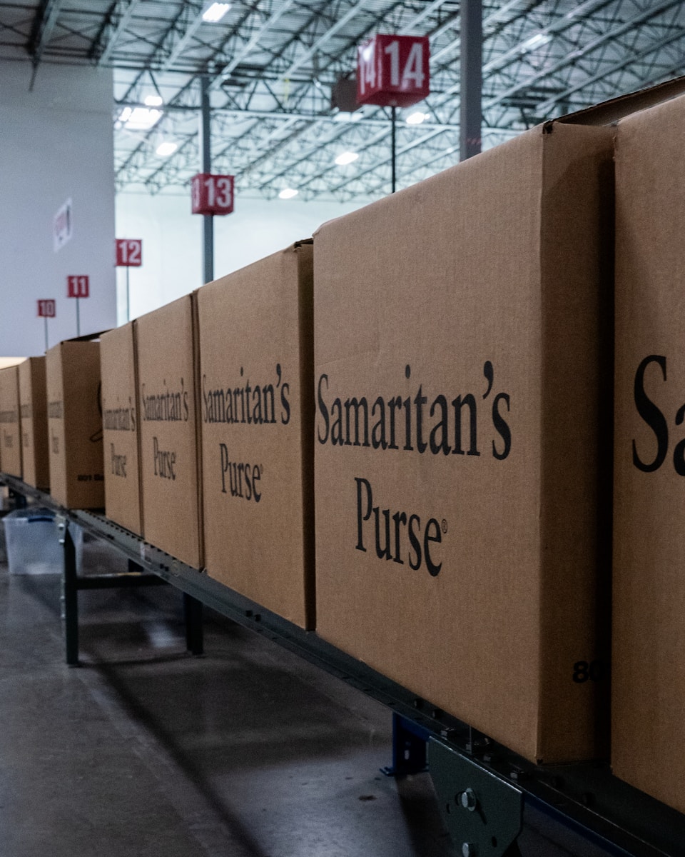 A row of boxes sitting on top of a conveyor belt